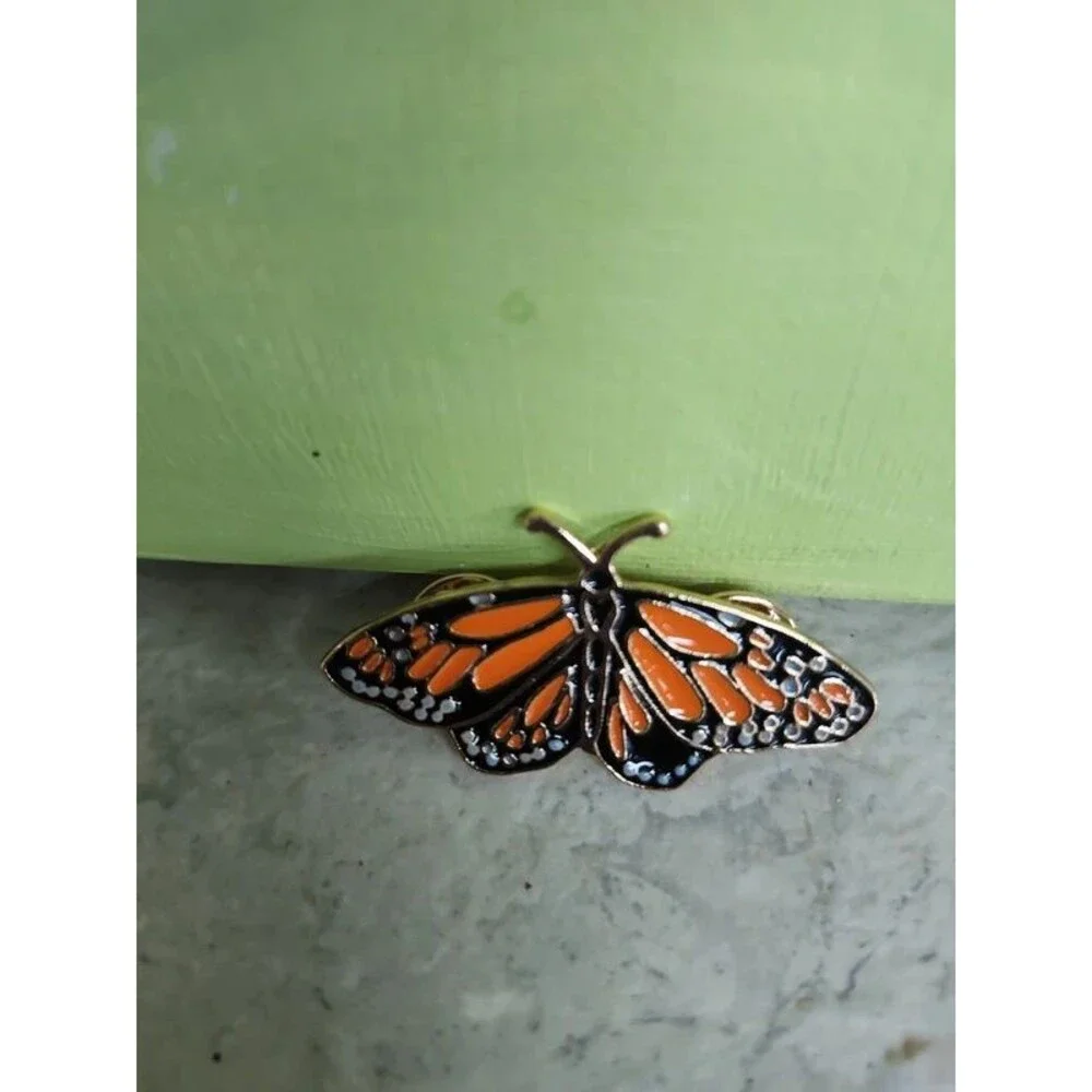 enamel over metal monarch butterfly brooch pin